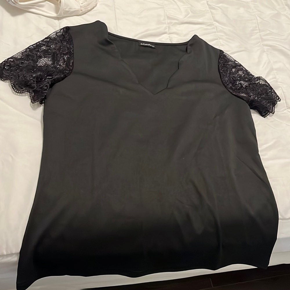 Black dressy top with scalloped neckline